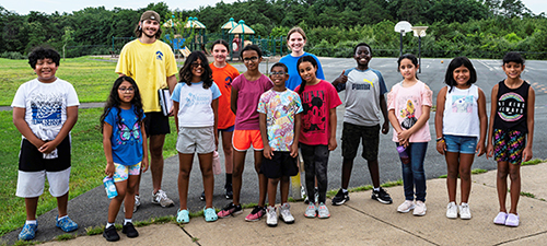 Children and teens facing the camera.
