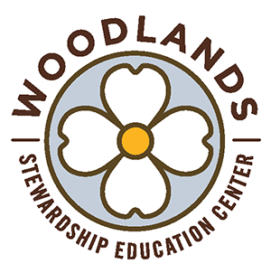 Woodlands logo.