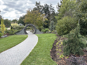 Sidewalk through Moon Gate.