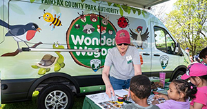 Volunteer teaching kids at the Fairfax County (VA) Park Authority's Wonder Wagon.