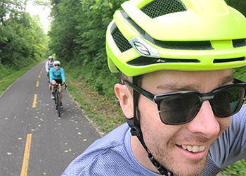 People biking on trail.