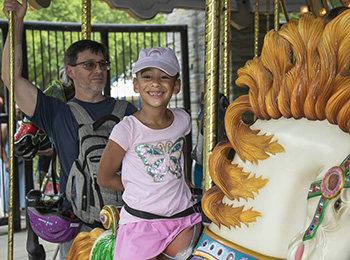Girl on the carousel.